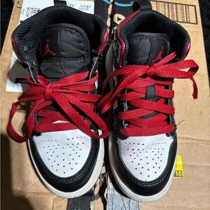 Black and White  Jordan Ones Sneakers with Red Laces